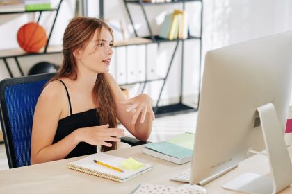 Teenage girl having online class